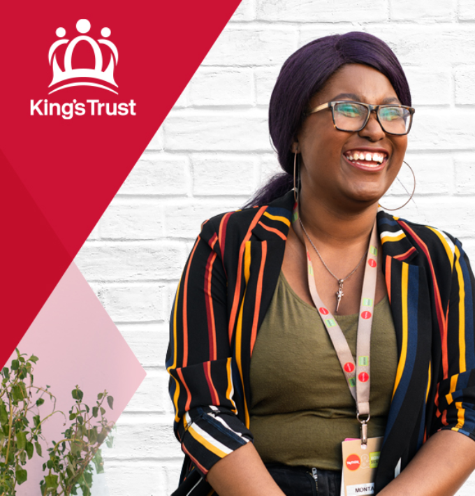 Woman smiling and looking happy in front of King's trust logo.